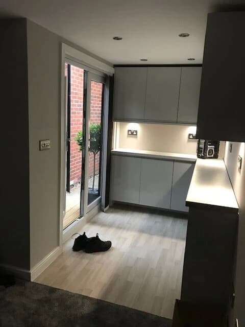 A finished garden room interior opening onto the garden