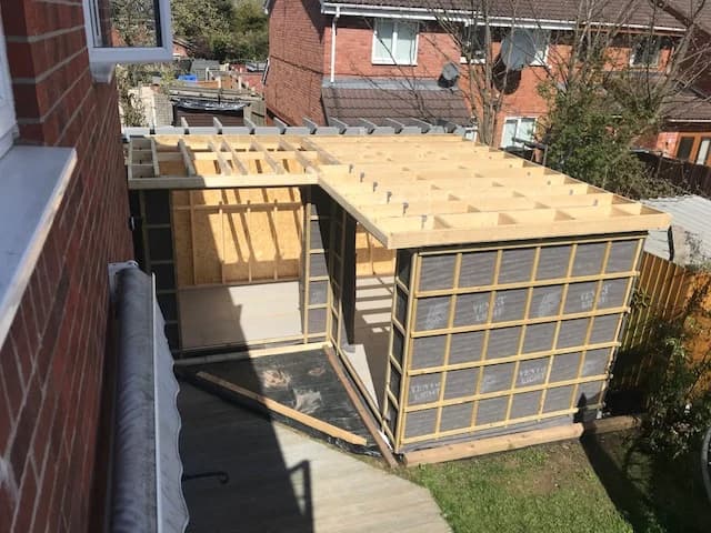 Timber walls and roof structure during construction of the garden room